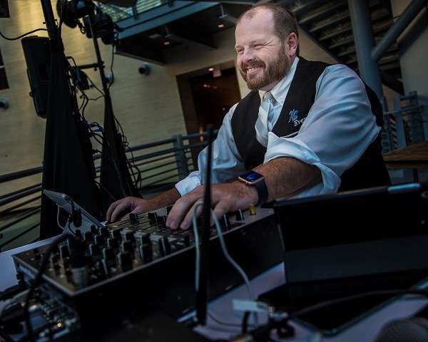 Matt Sutton with DJ equipment