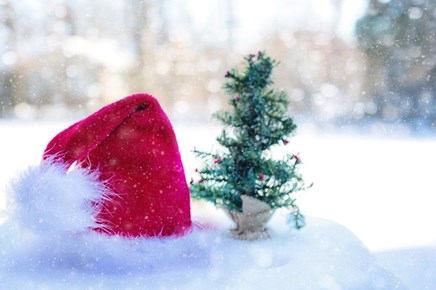 Santa hat sitting in the snow
