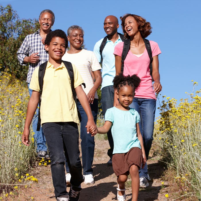 Family taking hike on one of the many local trails.