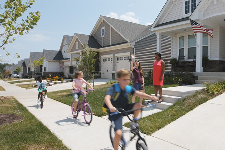 Kids riding bicycles around Embrey Mill