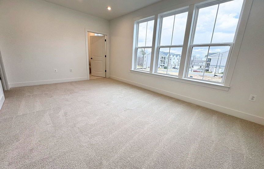 Amber primary bedroom built by Brookfield Residential at Cascades within Embrey Mill